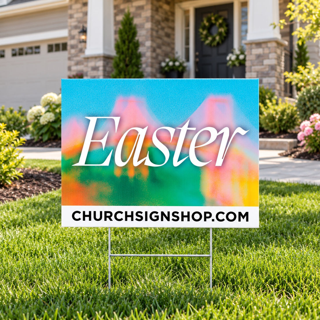 Church yard sign reading Easter on a wire stake in a front lawn
